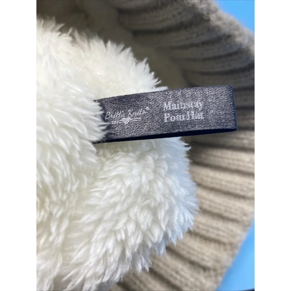 Britt's Knits Beige knit winter hat with faux fur pom pom